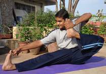 AKARNA- DHANURASANA 